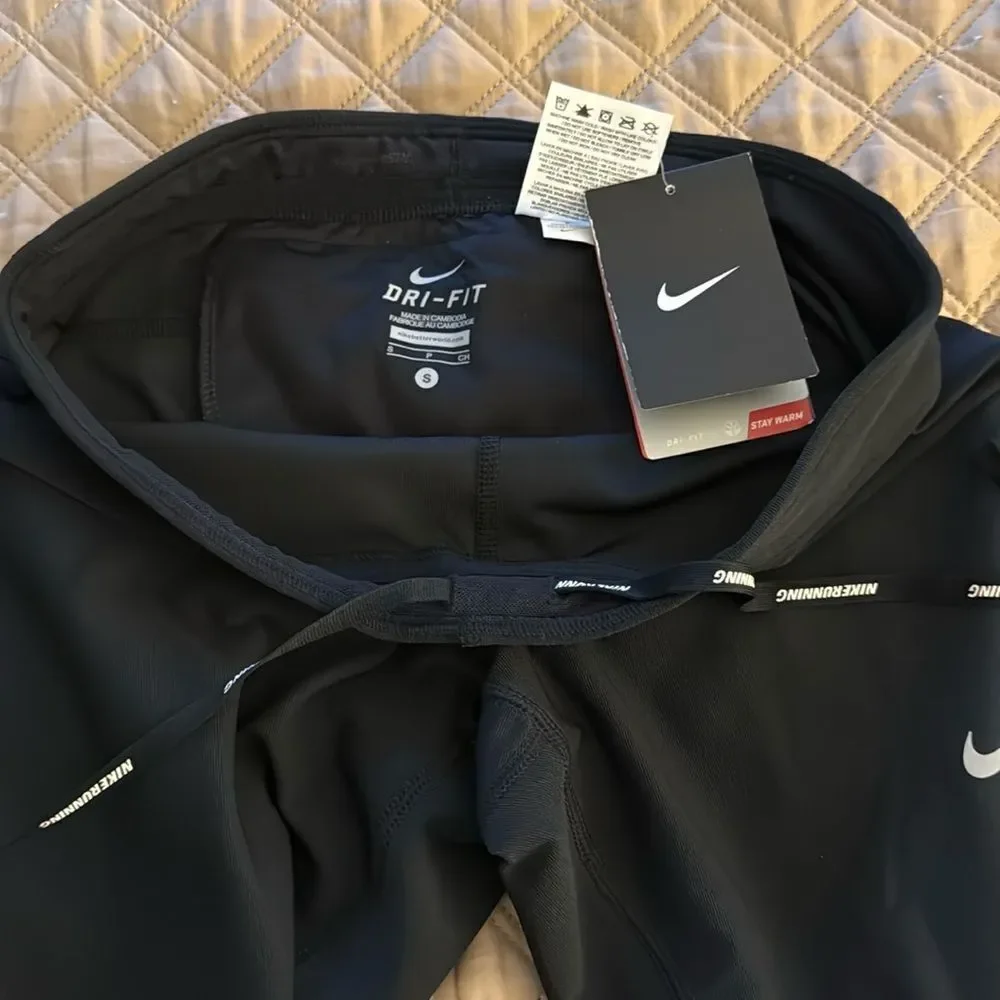 NWT Nike Dri-FIT Women’s Stay Warm Running Capri Leggings in Black. Size Small.